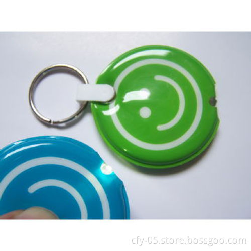 Supply plastic novelty LED promotional projection keyring torch light with customized logo